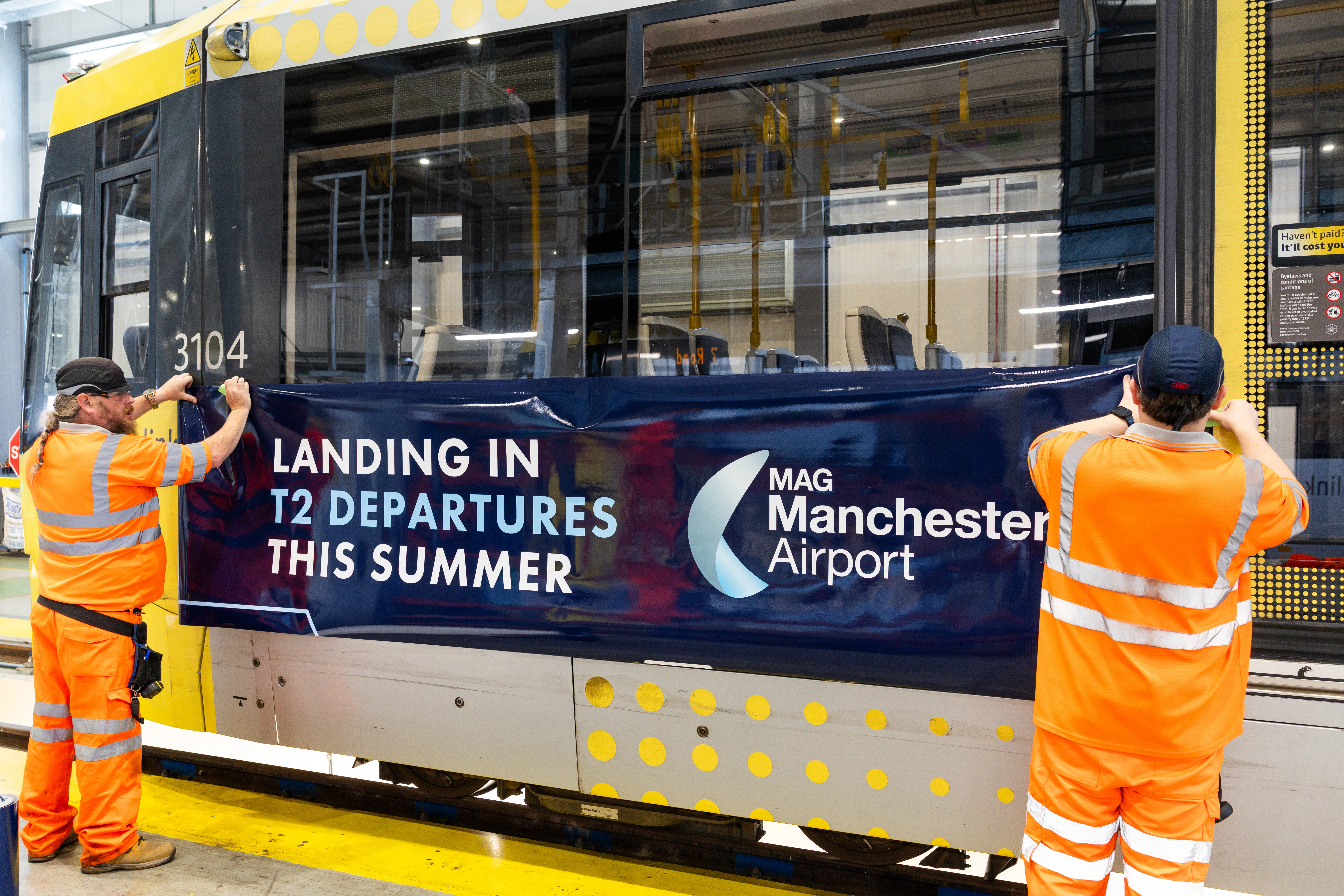 TfGM - Manchester Airport T2 Tram Wrap Installation