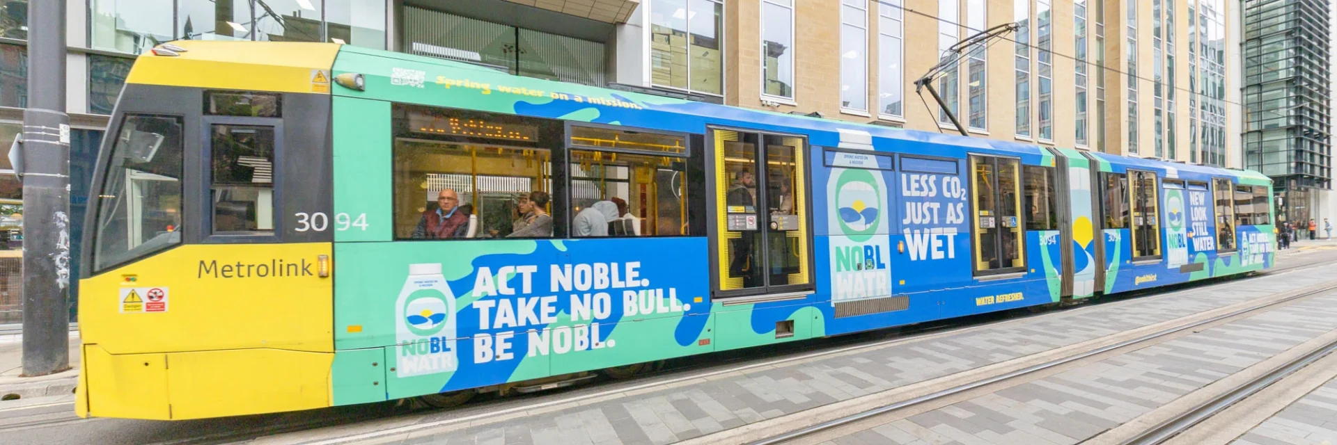 TfGM | Nobl Water Branded Tram Wrap & October Campaigns