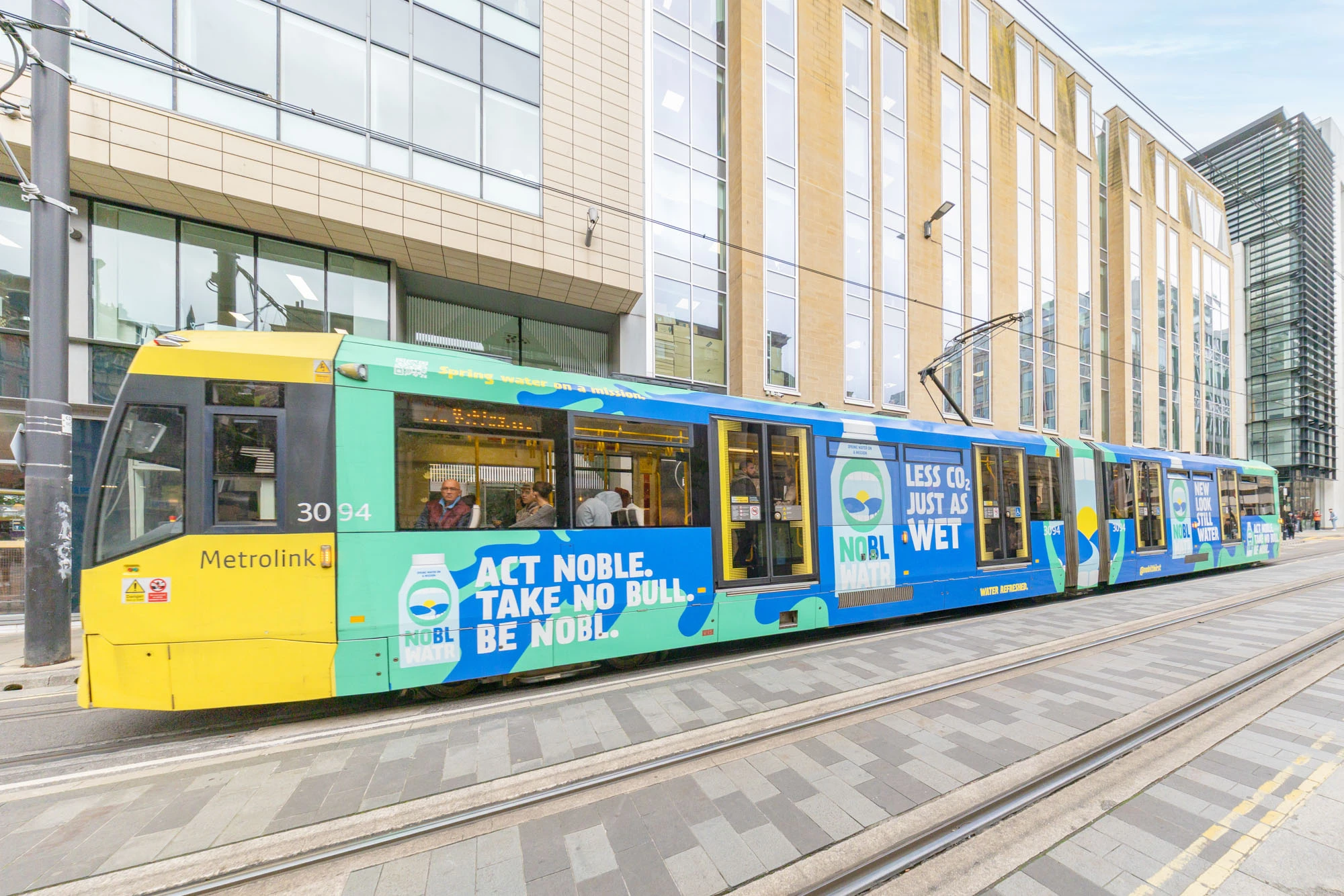 TfGM | Nobl Water Branded Tram Wrap & October Campaigns